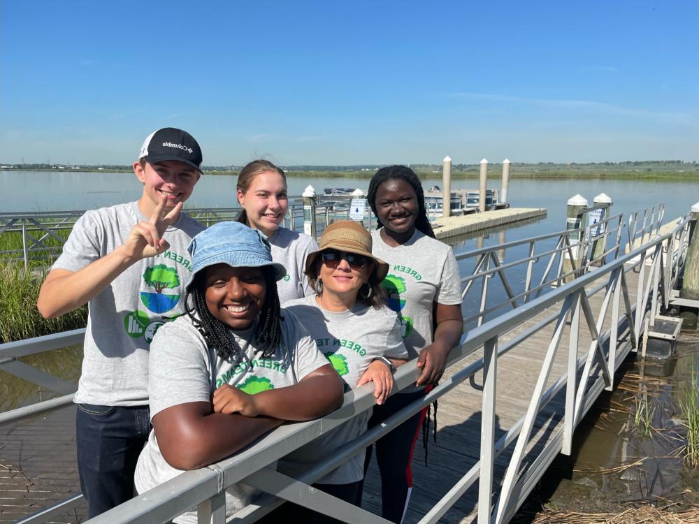 Martu Kollie (left) conducting research on community resiliency